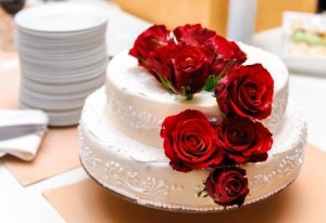 Wedding Cake Decorated With Red Roses